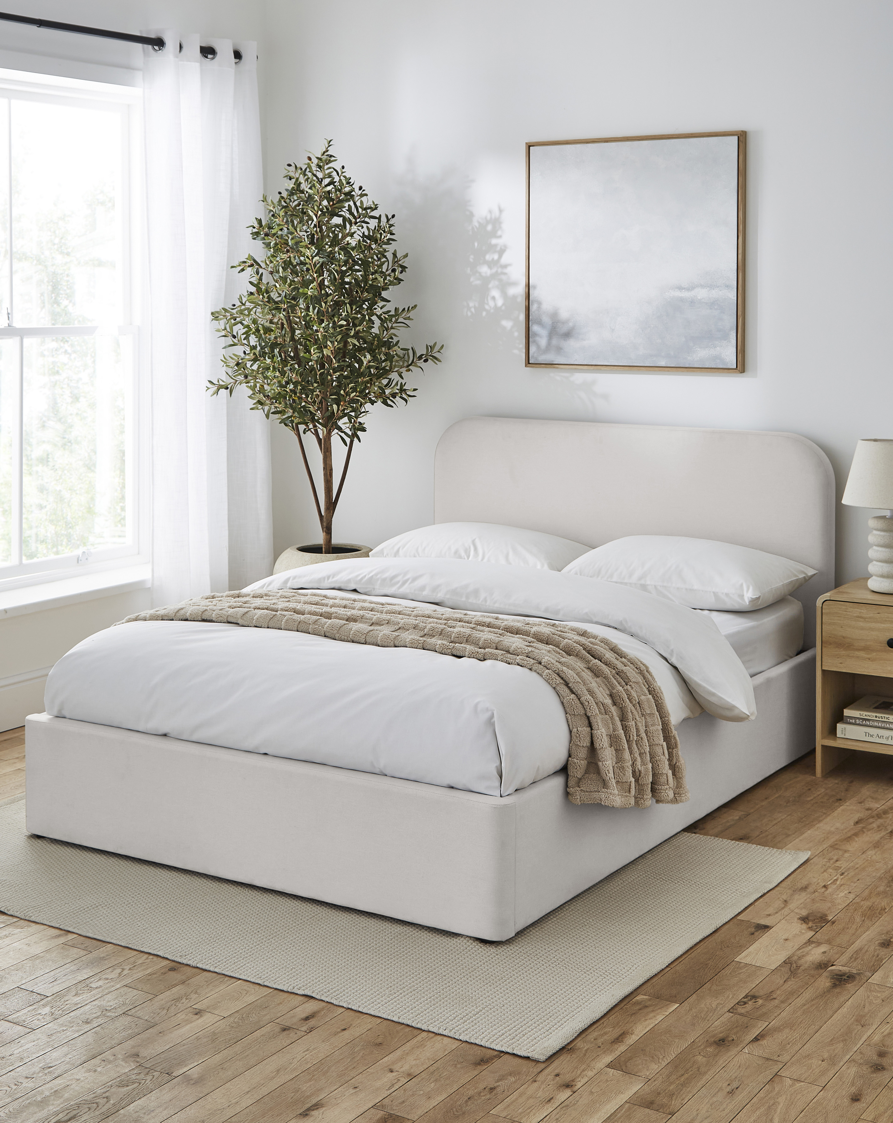 Emery Fabric Storage Ottoman Bed