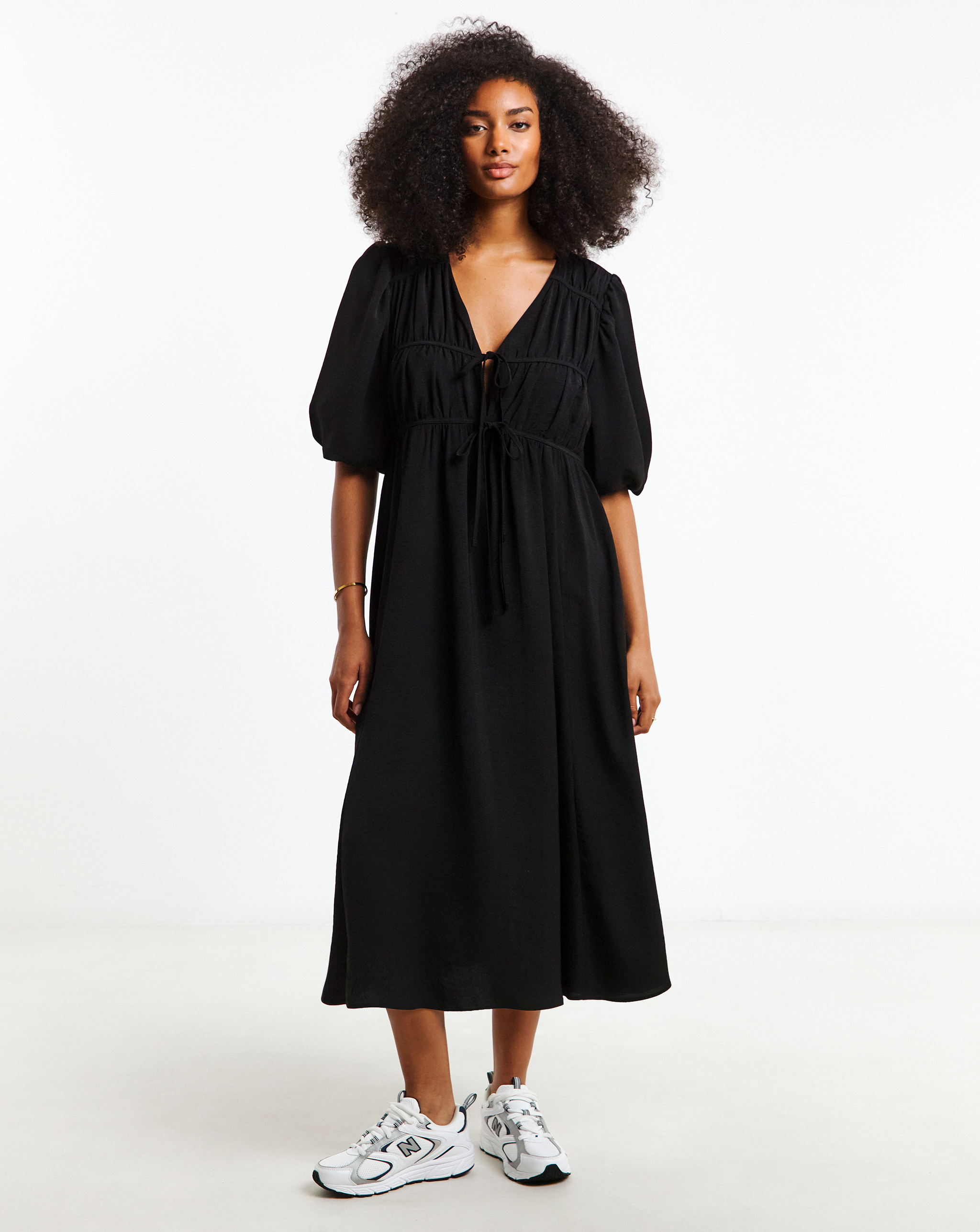 midi dresses with trainers How To Style A Midi Dress With Sneakers